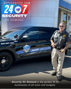 AOP Security officer next to his patrol car with verbiage stating that AOP Security offers 24/7 Security On Demand.