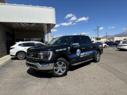 AOP Security patrol vehicle arrives to a business front in Albuquerque, NM